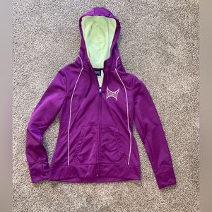 Tap out zip up, jersey material, size small. Magenta and dull yellow green.